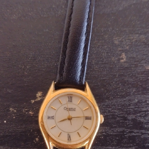 Bulova Gold and Black Leather Watch